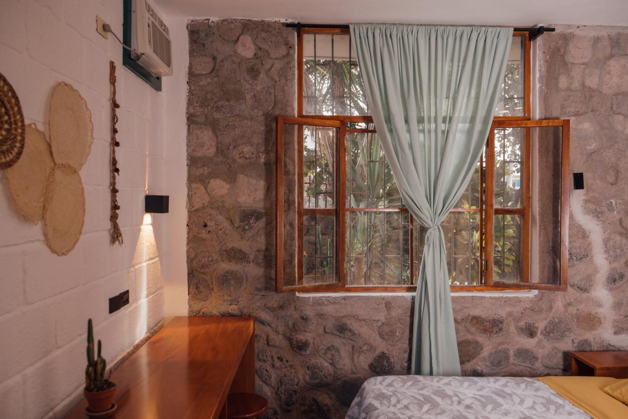 Hostal Pimampiro ปูแอร์โต บาเกริโซ โมเรโน ภายนอก รูปภาพ